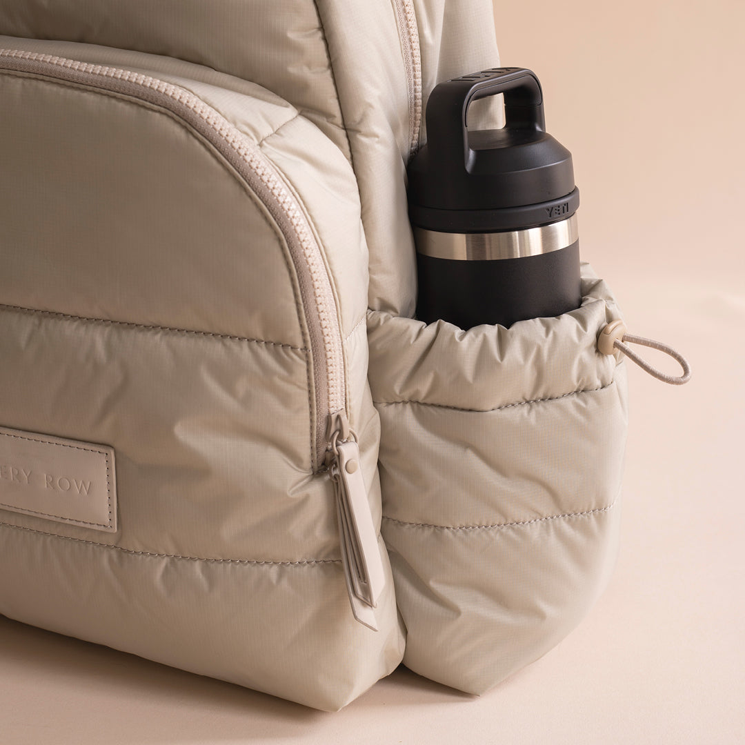 Avery Row Baby Changing Backpack - Oyster
