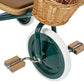 Close-up of a tricycle wheel with a wicker basket on a white background