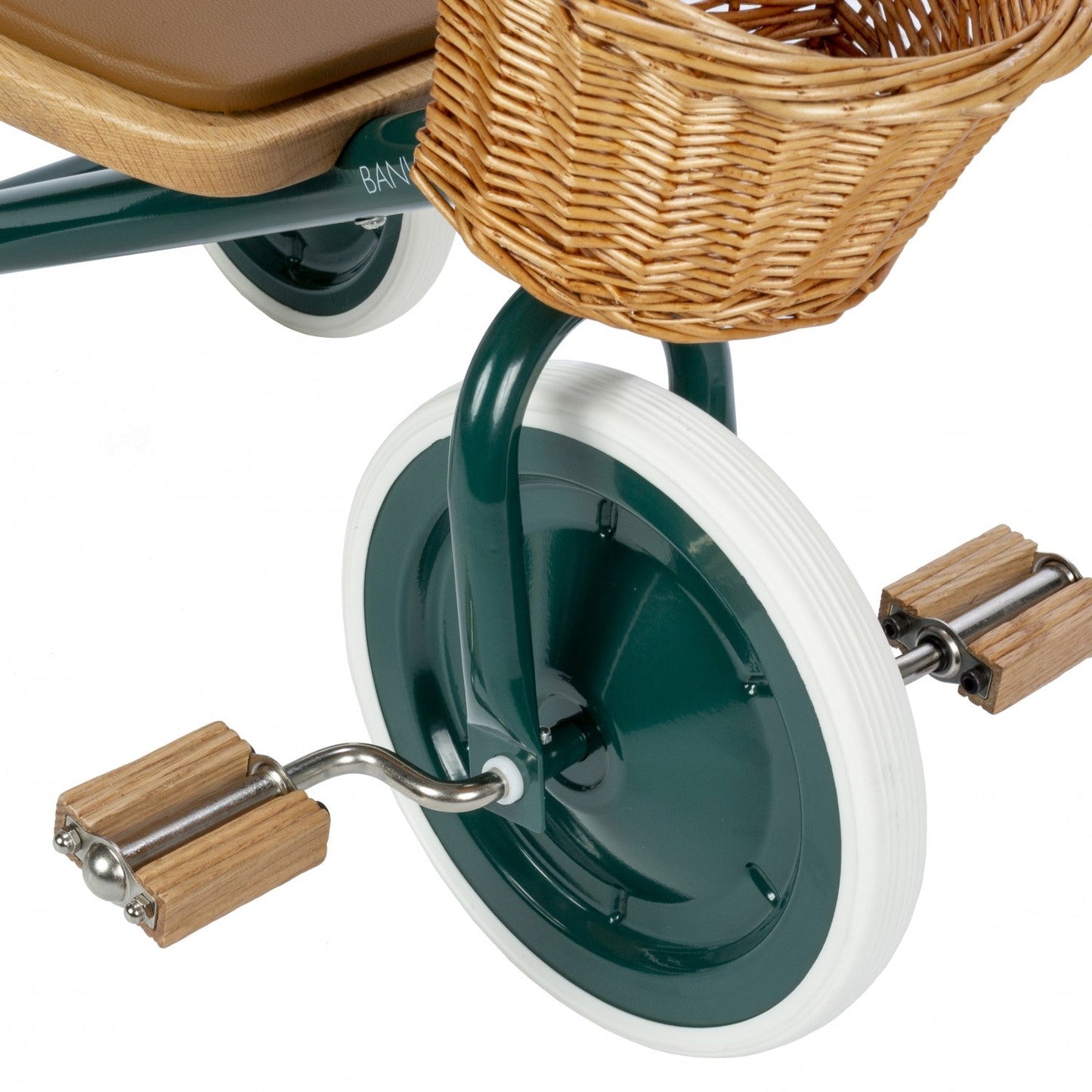 Close-up of a tricycle wheel with a wicker basket on a white background
