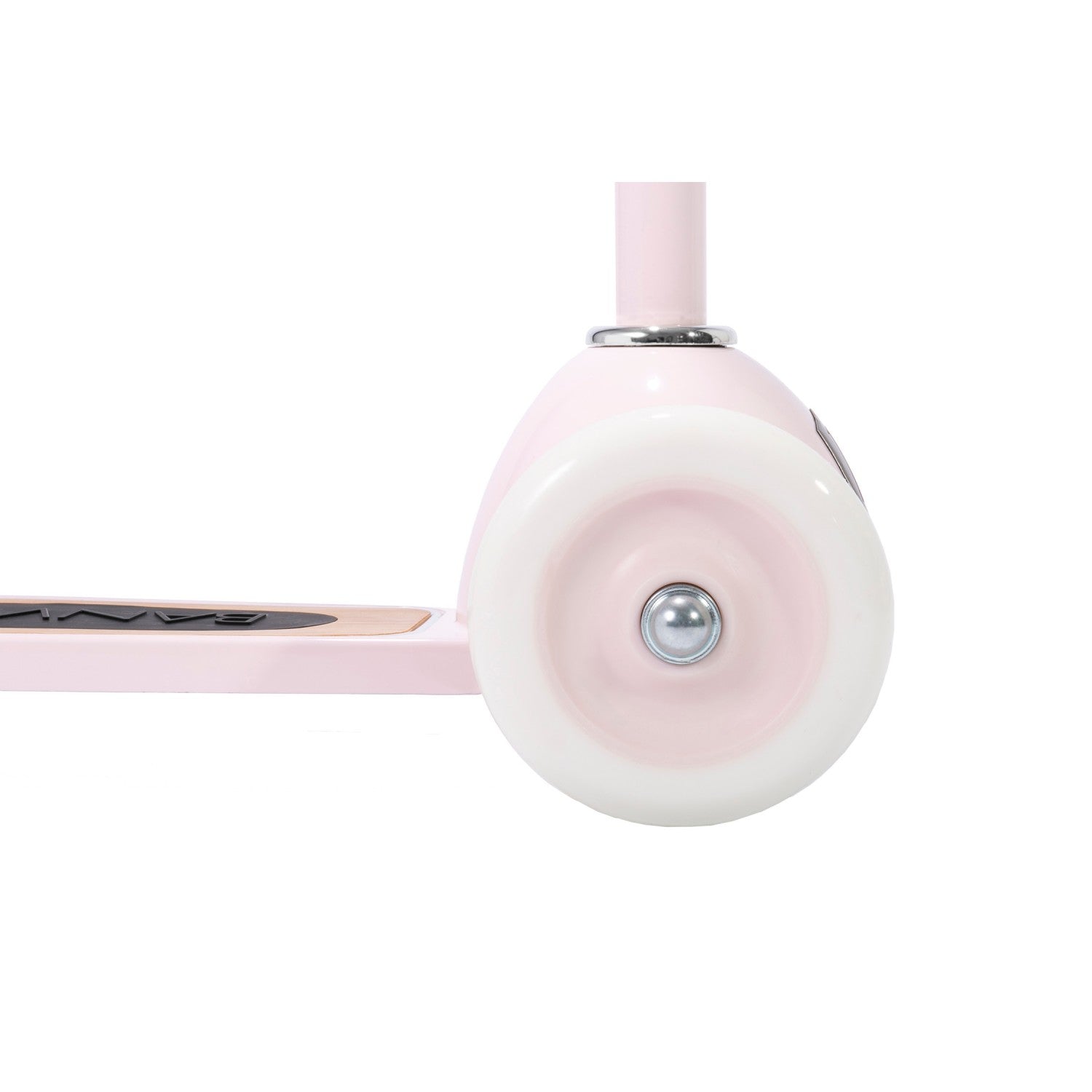 Close-up of a pink scooter wheel on a white background