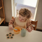 Mushie Silicone Baby Sensory Flower Pop Toy - Thyme/Natural/Shifting Sand